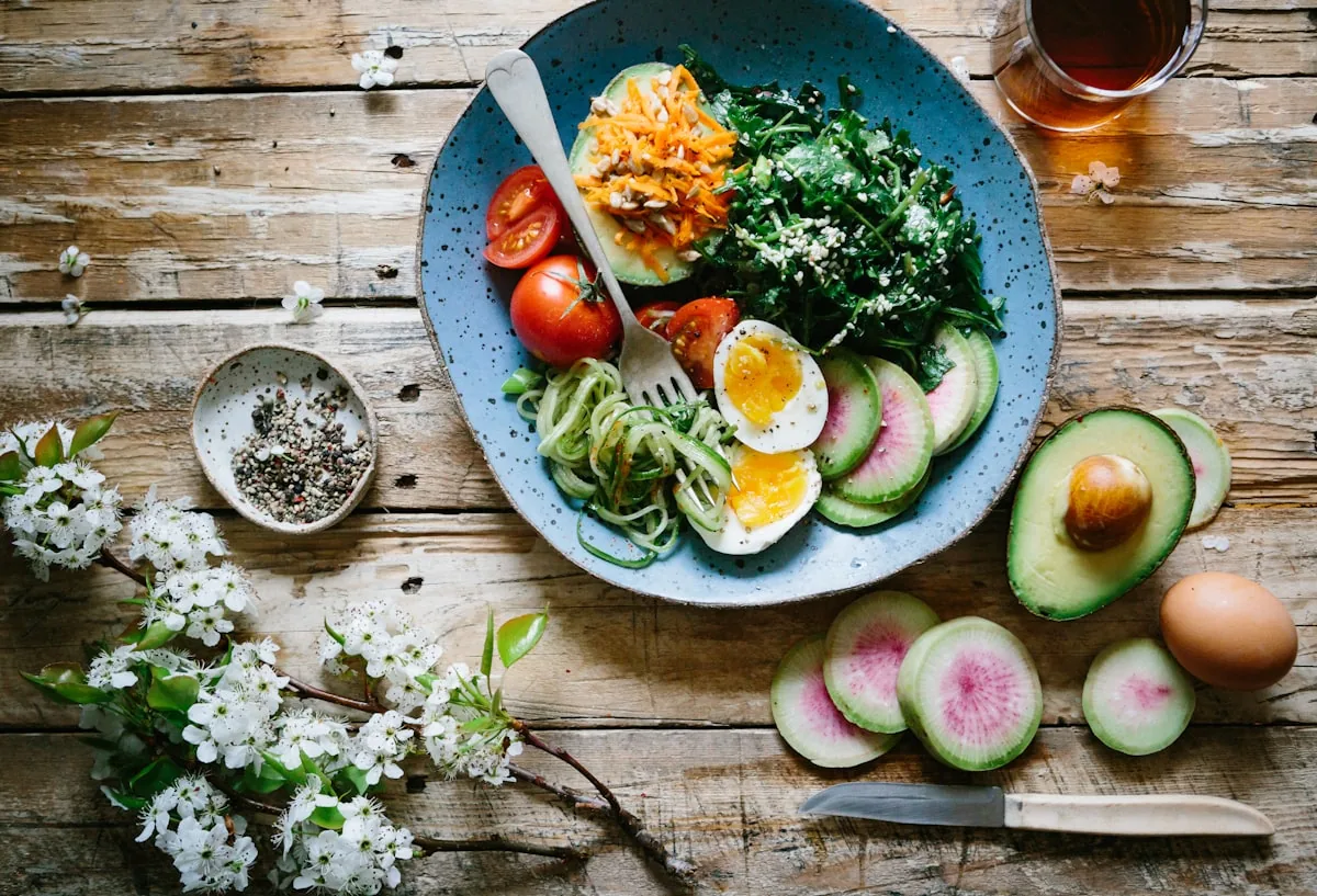 Calm wooden table with a simple bowl of seasonal food